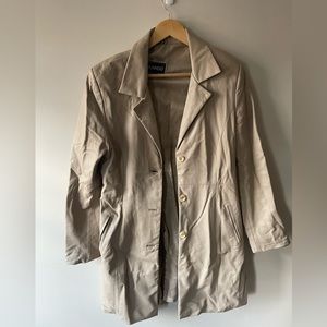 Mid length beige leather trench coat in women’s medium